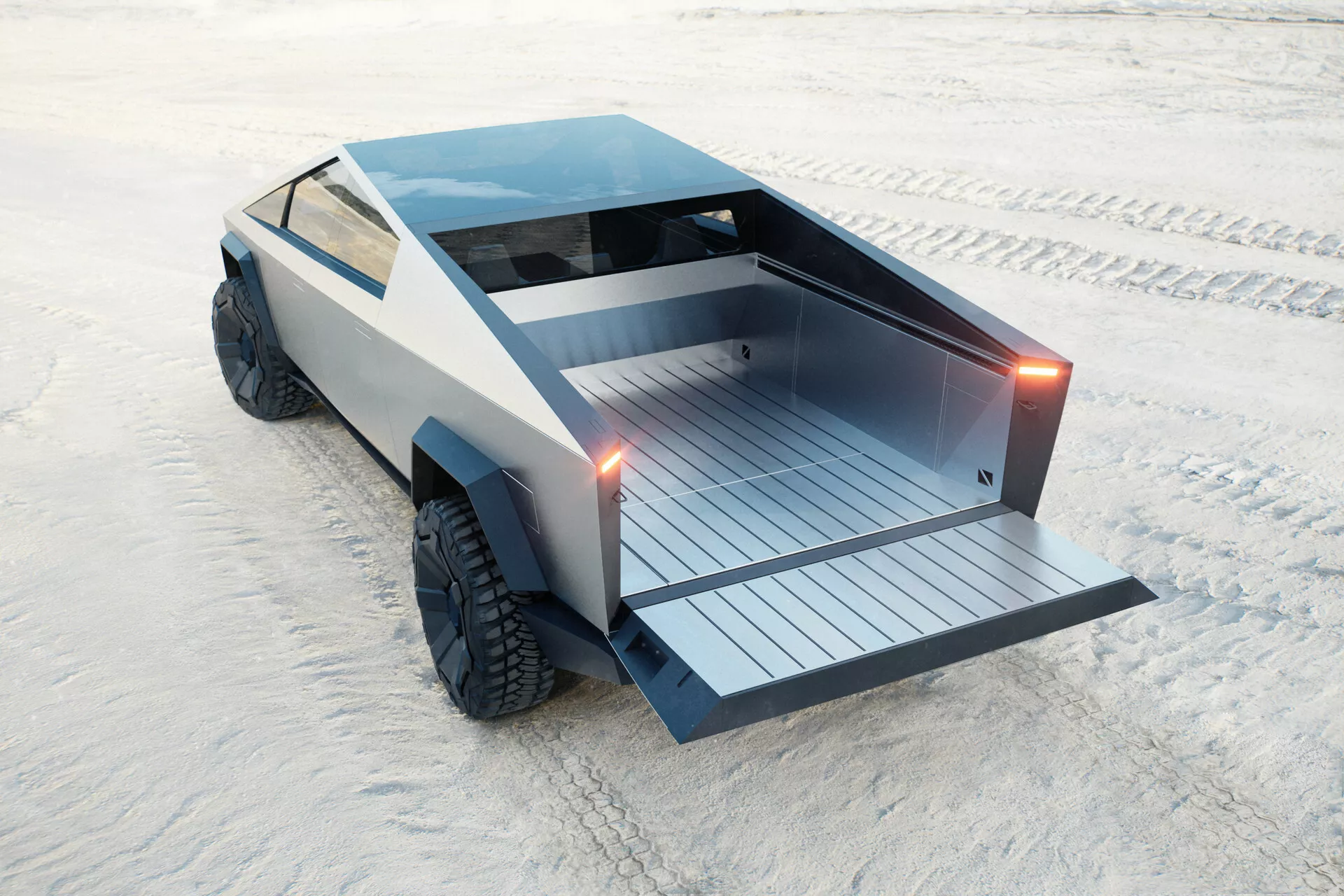 La imagen muestra el futurista Tesla Cybertruck 2021 (1ª generación) desde un ángulo trasero tres cuartos elevado, revelando su distintivo diseño geométrico angular y construcción robusta. La camioneta tiene un acabado metálico y grandes neumáticos todoterreno con un grosor considerable, lo que sugiere capacidad en condiciones de manejo difíciles. Los detalles notables incluyen luces traseras verticales delgadas, un área de carga plana con listones horizontales y un diseño trasero limpio sin manija visible en la puerta trasera. El entorno parece ser nevado a plena luz del día, destacando la posible durabilidad avanzada de la camioneta y materiales compuestos ligeros para mayor eficiencia.